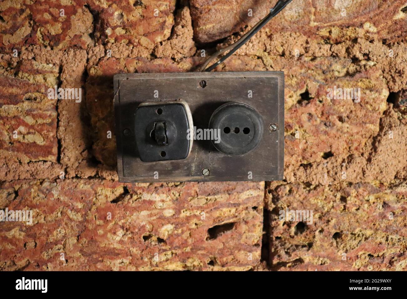 Old Vintage Light Switch And Electric Plug Socket. Antique style flush