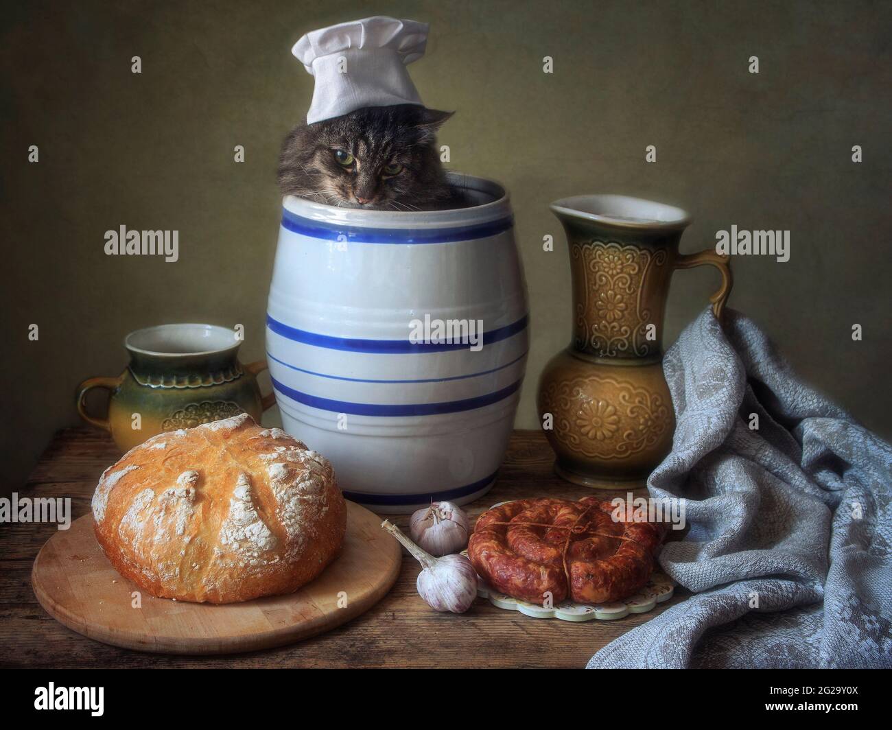 Two cats on the kitchen rustic table Stock Photo Alamy