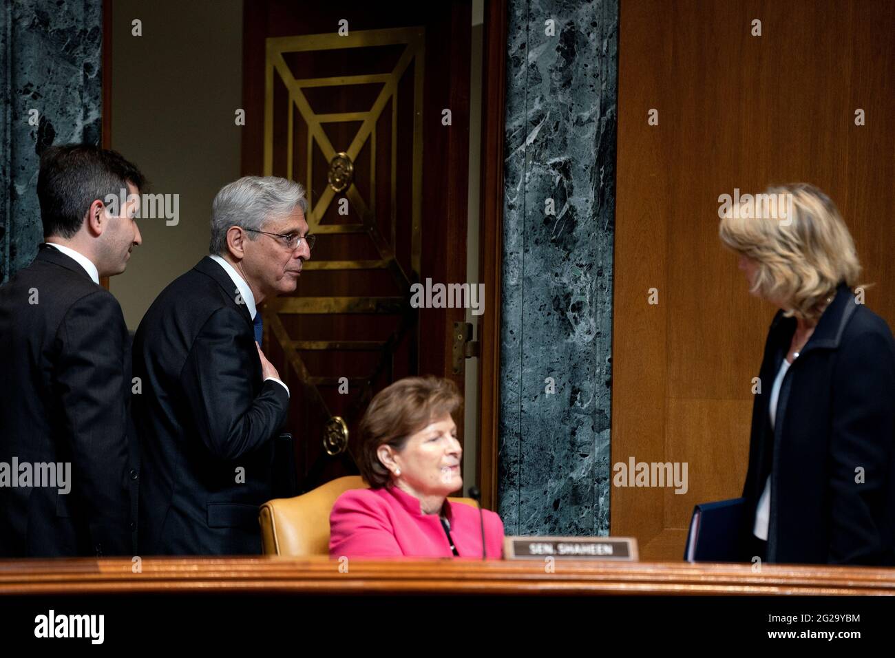 Merrick Garland U S Attorney General Speaks To Senator Jeanne Shaheen D Nh And Senator Lisa Murkowski R Ak During A Break In The Senate Appropriations Subcommittee On Commerce Justice Science And Related Agencies Hearing