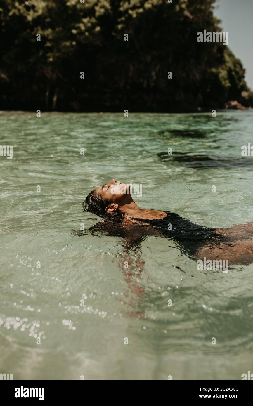Woman swim water eyes hi-res stock photography and images - Alamy