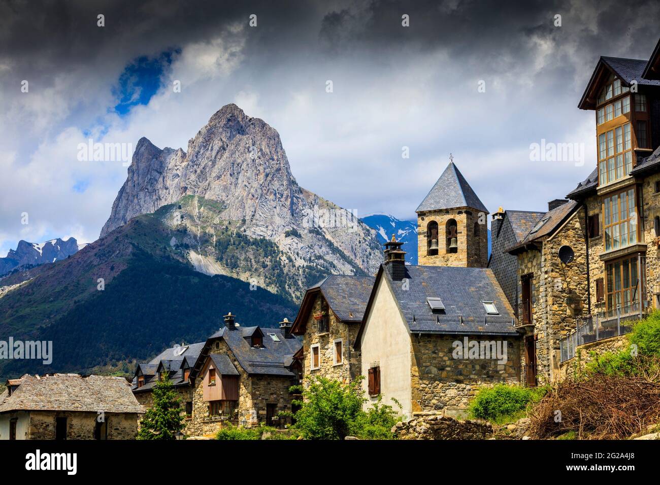 The village of Lanuza by the lake and the peak Foratata in the ...