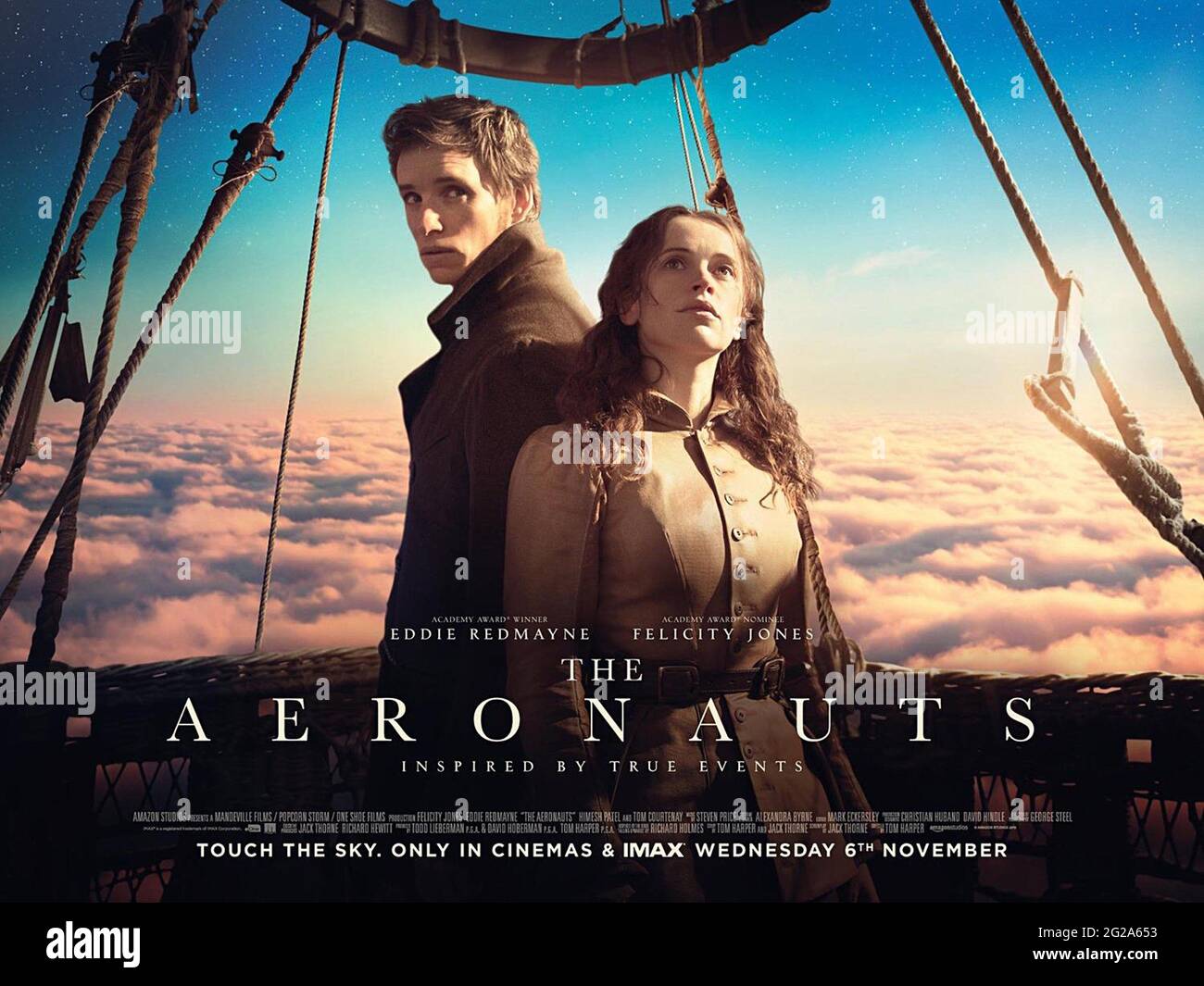 USA. Felicity Jones and Eddie Redmayne in the ©Amazon Studios new movie:  The Aeronauts (2019). Plot: Pilot Amelia Wren (Felicity Jones) and  scientist James Glaisher (Eddie Redmayne) find themselves in an epic