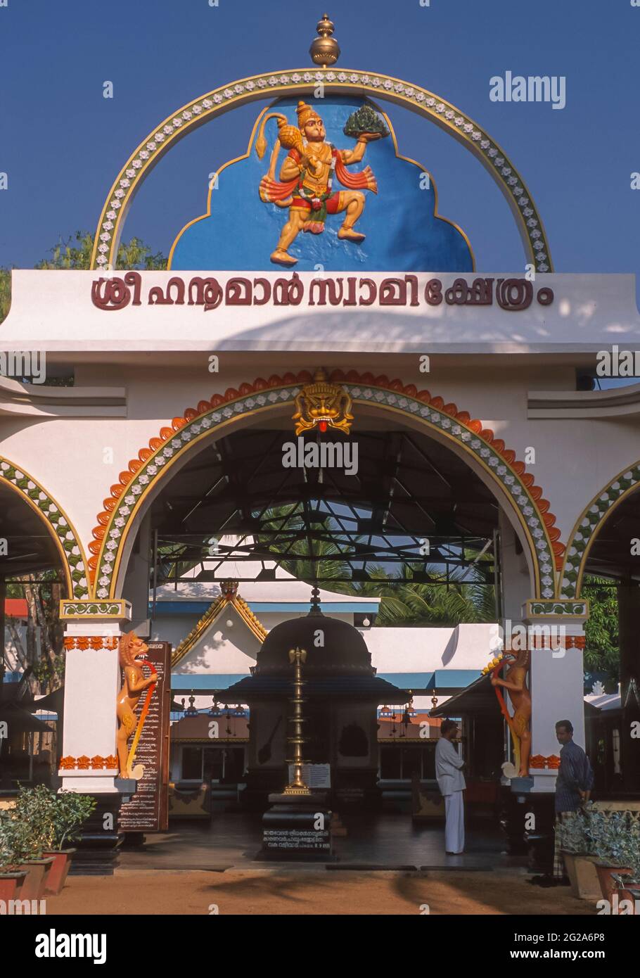 THRISSUR, KERALA, INDIA - Depiction of Hindu god Hanuman over archway of temple. Stock Photo