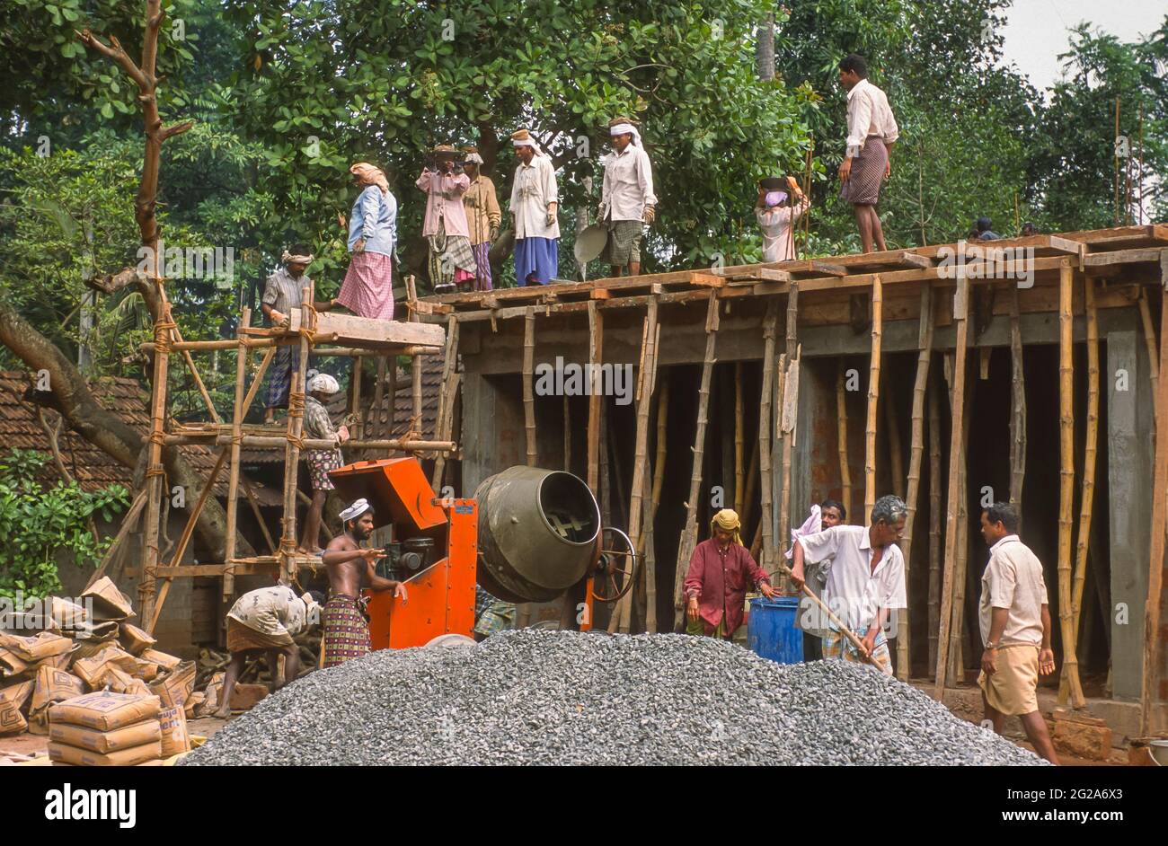 KOTTAYAM, KERALA STATE, INDIA Workers at construction site in western