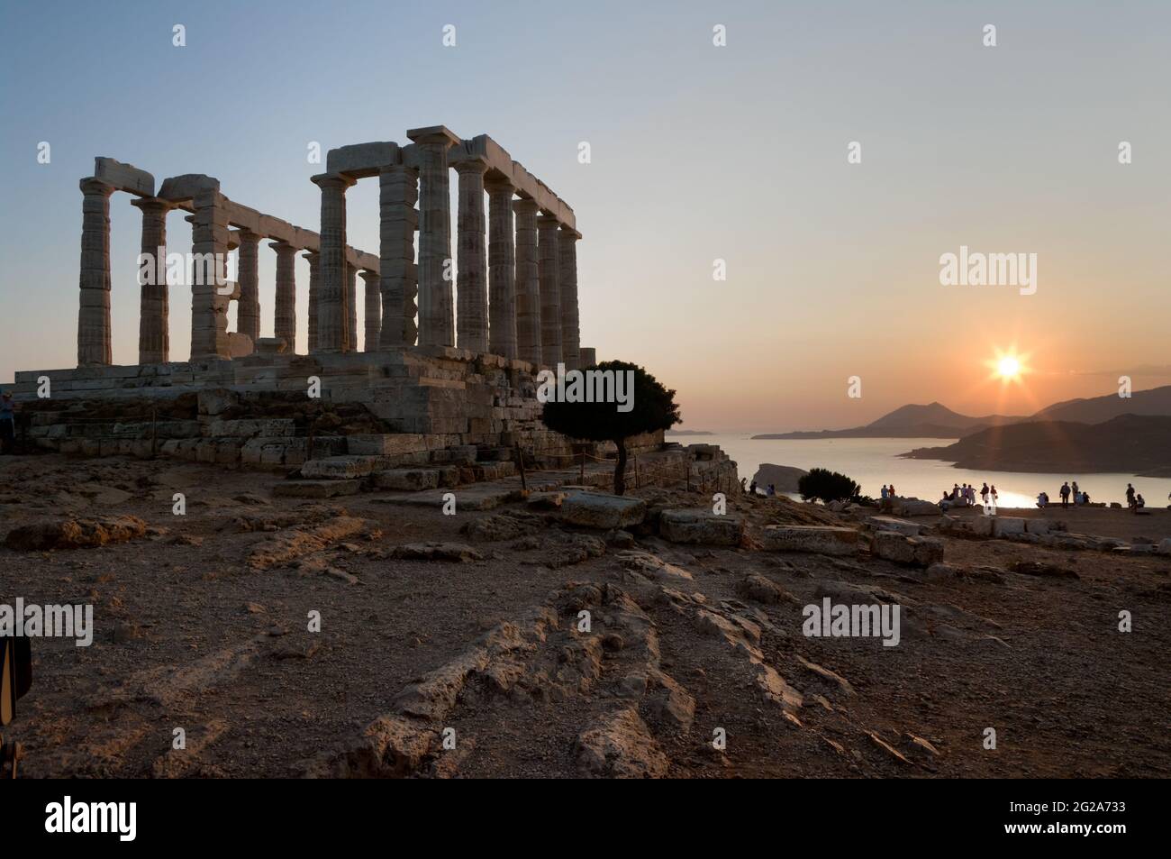 temple of Poseidon on coast of cape Sounion at the sunset Stock Photo ...