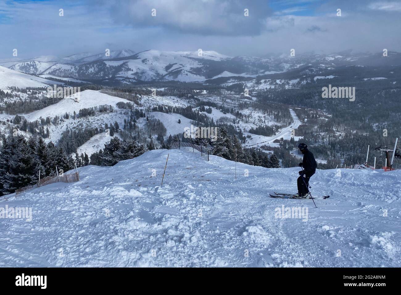 Lone skier near summit of Bear Paw Ski Bowl near Havre, Montana Stock
