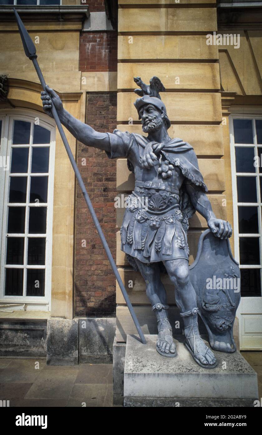 Warrior statur in the gardens of Hampton Court, the former royal palace in the Southwest of London. Stock Photo