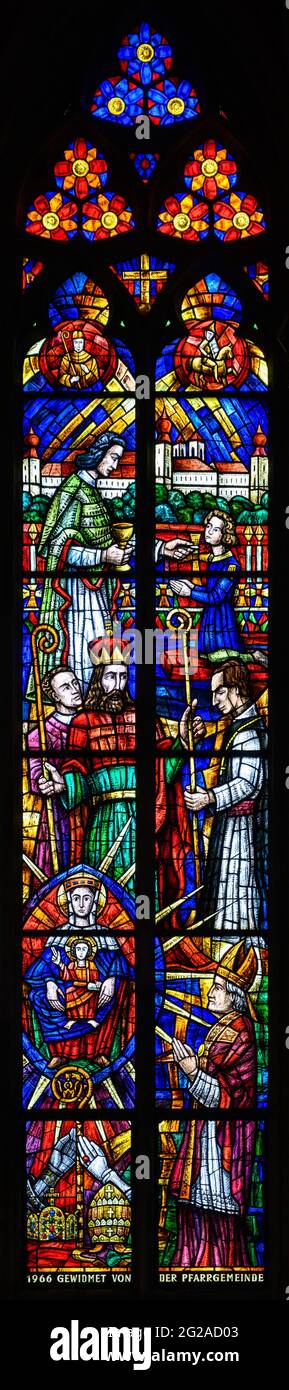 Stained-glass window depicting Altmann the bishop of Passau and the investiture controversy. Votivkirche – Votive Church, Vienna, Austria. Stock Photo