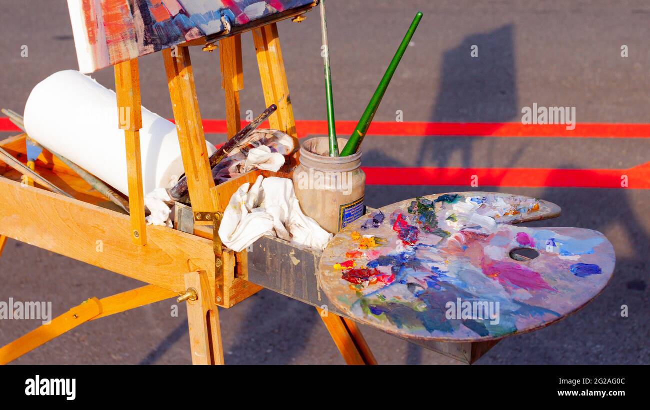 Street artist's painting materials Stock Photo