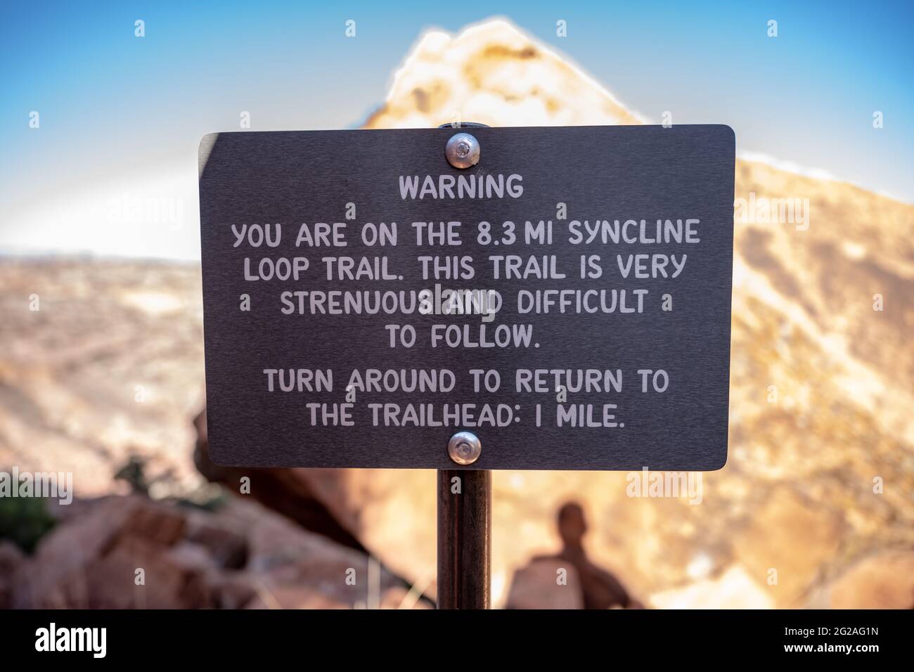 Warning Sign on Syncline Loop Trail in Canyonlands National Park Stock Photo