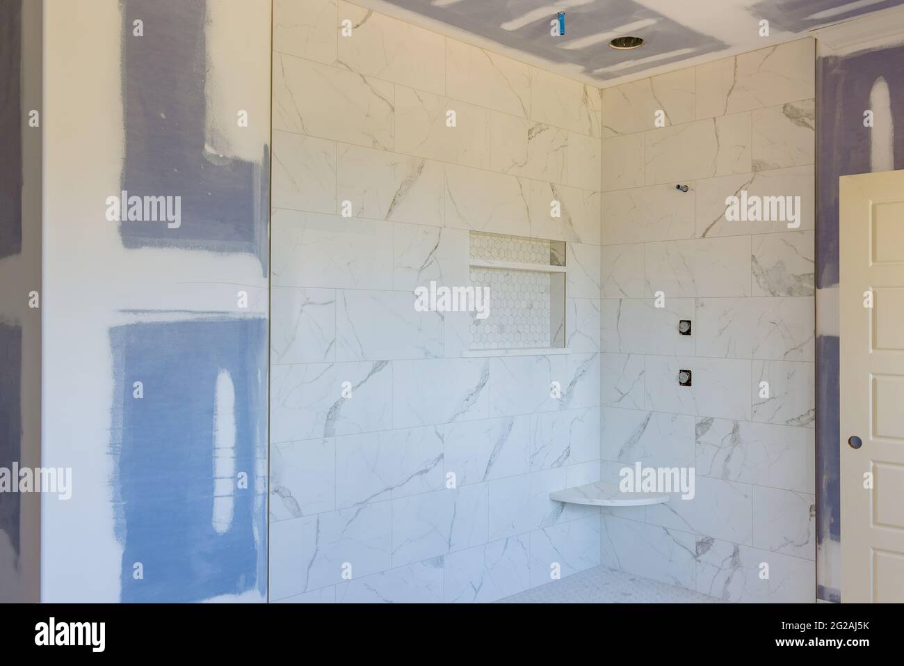 Designer renovation construction bathroom with master bathroom patching drywall Stock Photo