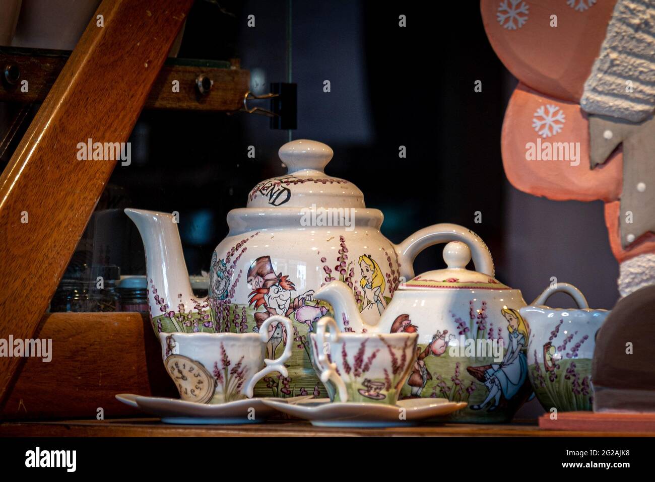 Cute handcrafted Alice in Wonderland animated movie tea set Stock Photo