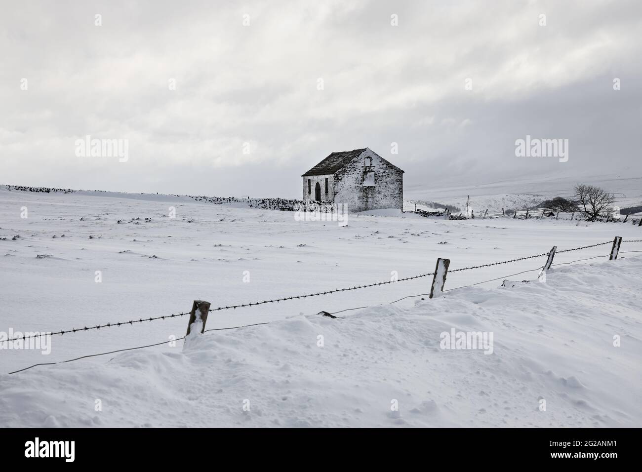 Drifting Snow and Old Barn, Harwood, Teesdale, County Durham, UK Stock Photo