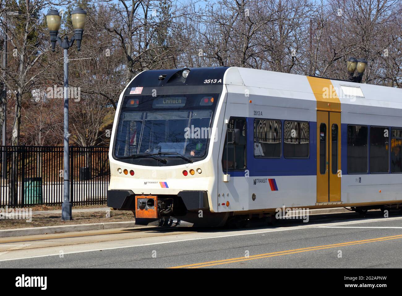 A NJ Transit River Line diesel light rail tram train travelling along South Delaware Ave near the Camden waterfront Stock Photo