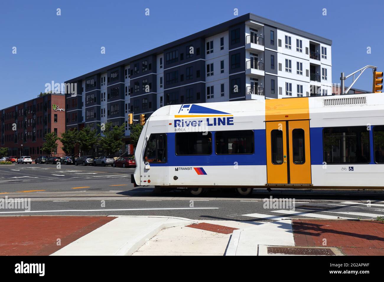 A NJ Transit River Line diesel light rail train makes a turn onto