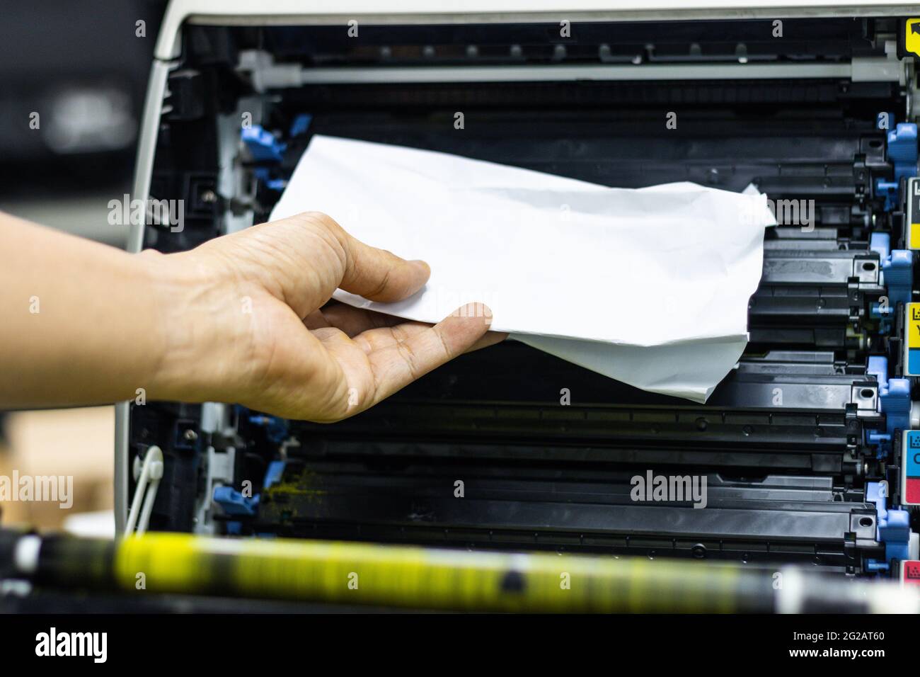 Technicians Removing Paper Stuck, Paper Jam In Printer At Office Stock