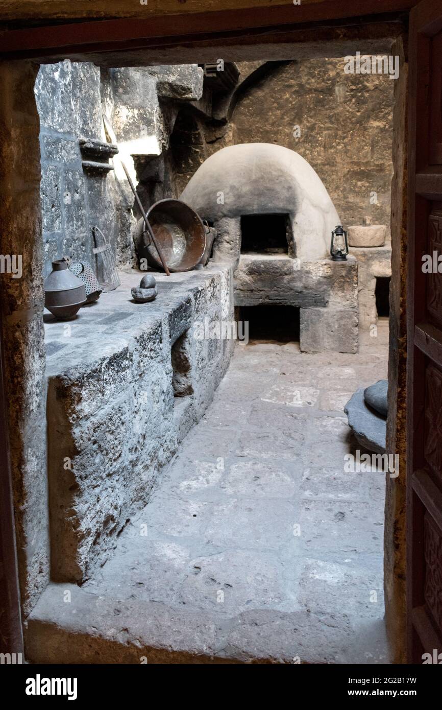 Rustic kitchen in historic nun's living quarters in the Santa Catalina Monastery, Arequipa, Peru Stock Photo