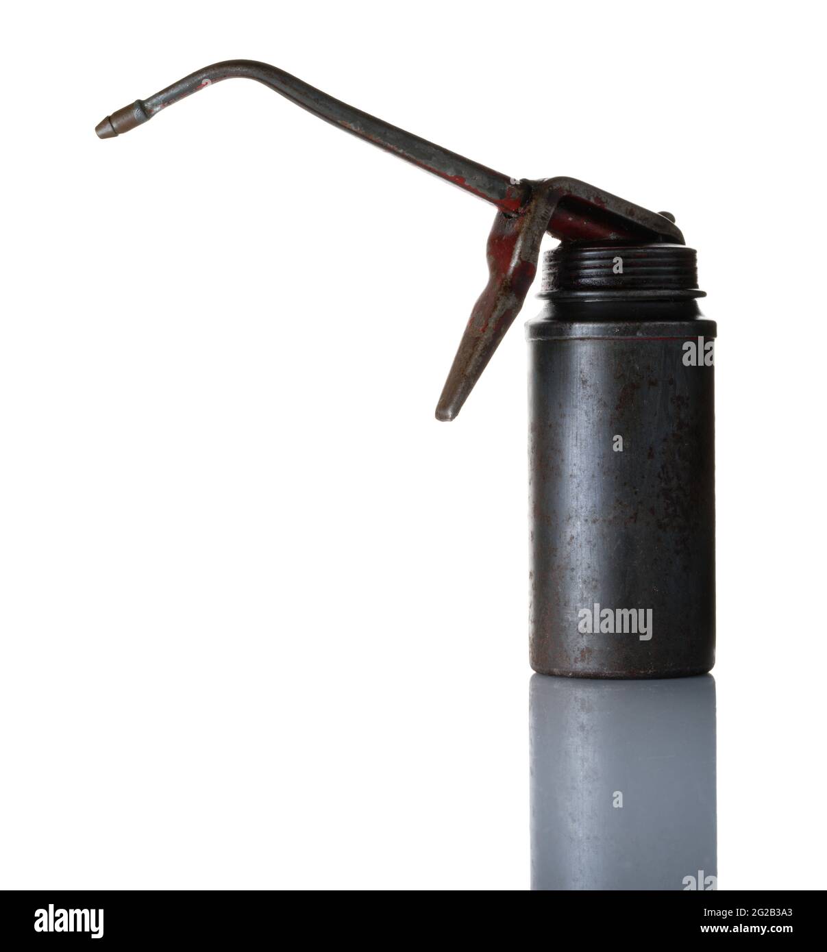An old oil can with trigger for squirting oil out of long spout. Stock Photo