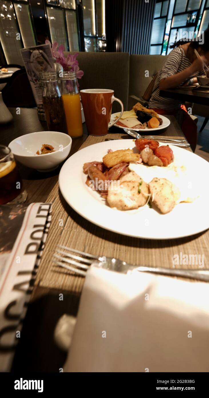 Eating out star dining restaurant breakfast newspaper come and get it Stock Photo - Alamy