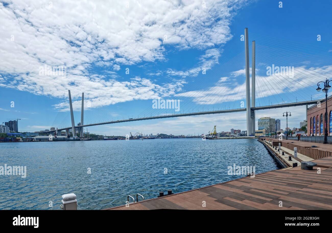 The Golden Bridge across the Golden Horn Bay in Vladivostok City, Far-East of Russia Stock Photo