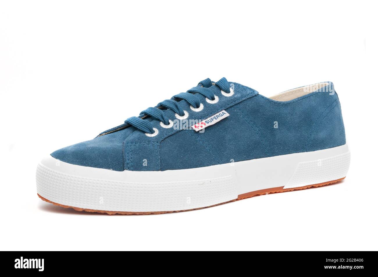 Carrara, Italy - June 09, 2021 - Blue Superga casual sneaker isolated on white background Stock Photo