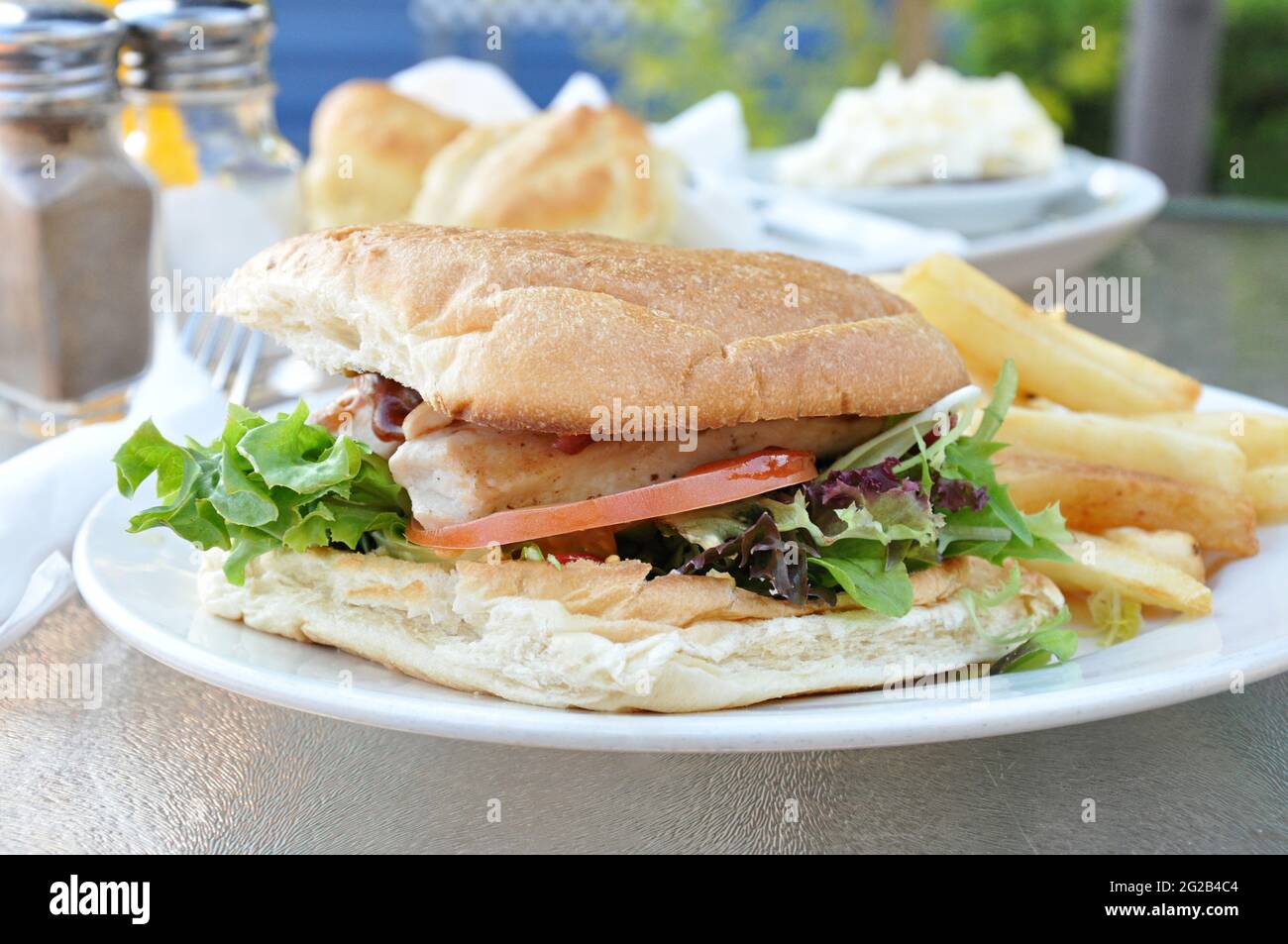 Chicken burger with French fries Stock Photo