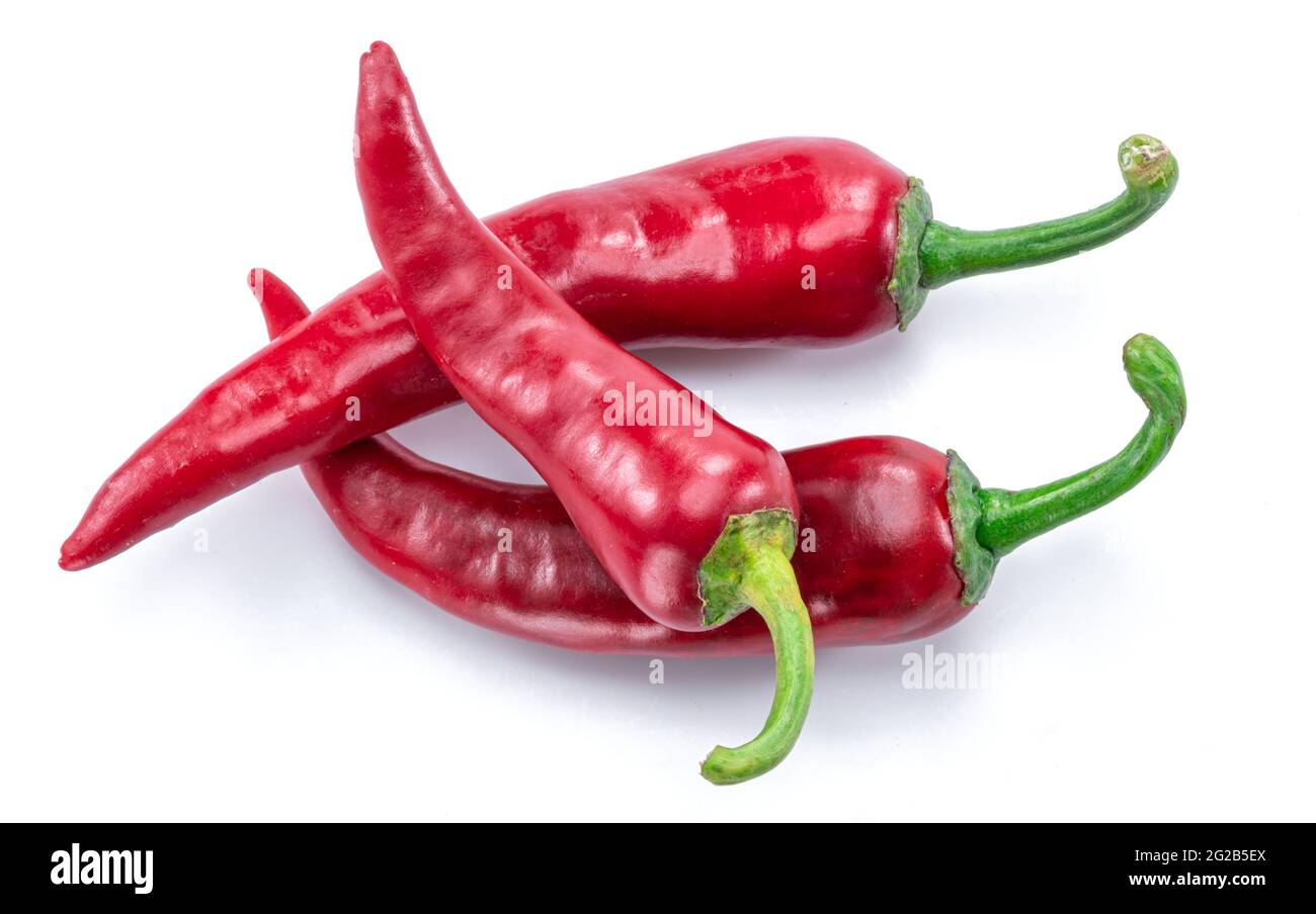 Fresh red chilli peppers isolated on white background Stock Photo - Alamy