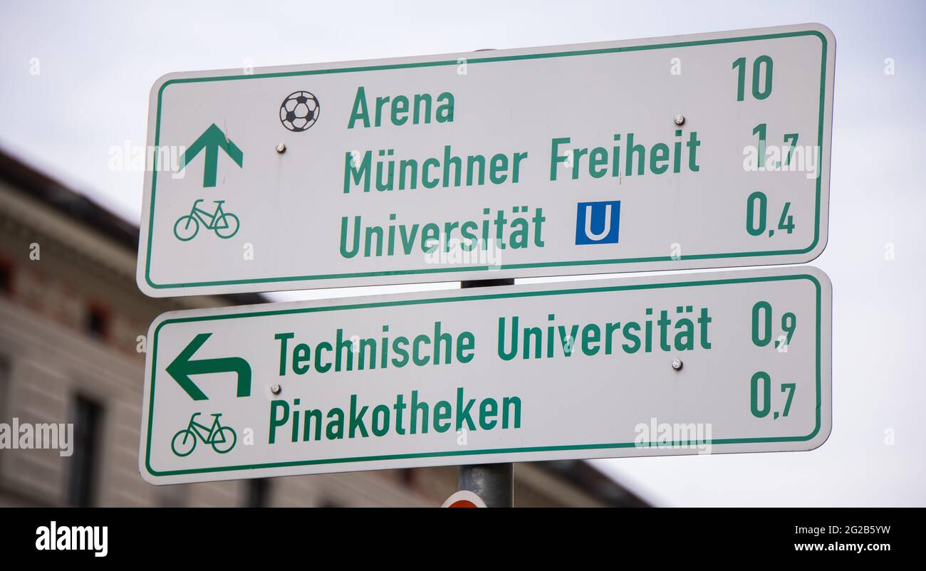 Direction signs in the city center of Munich - MUNICH, GERMANY - JUNE 03, 2021 Stock Photo