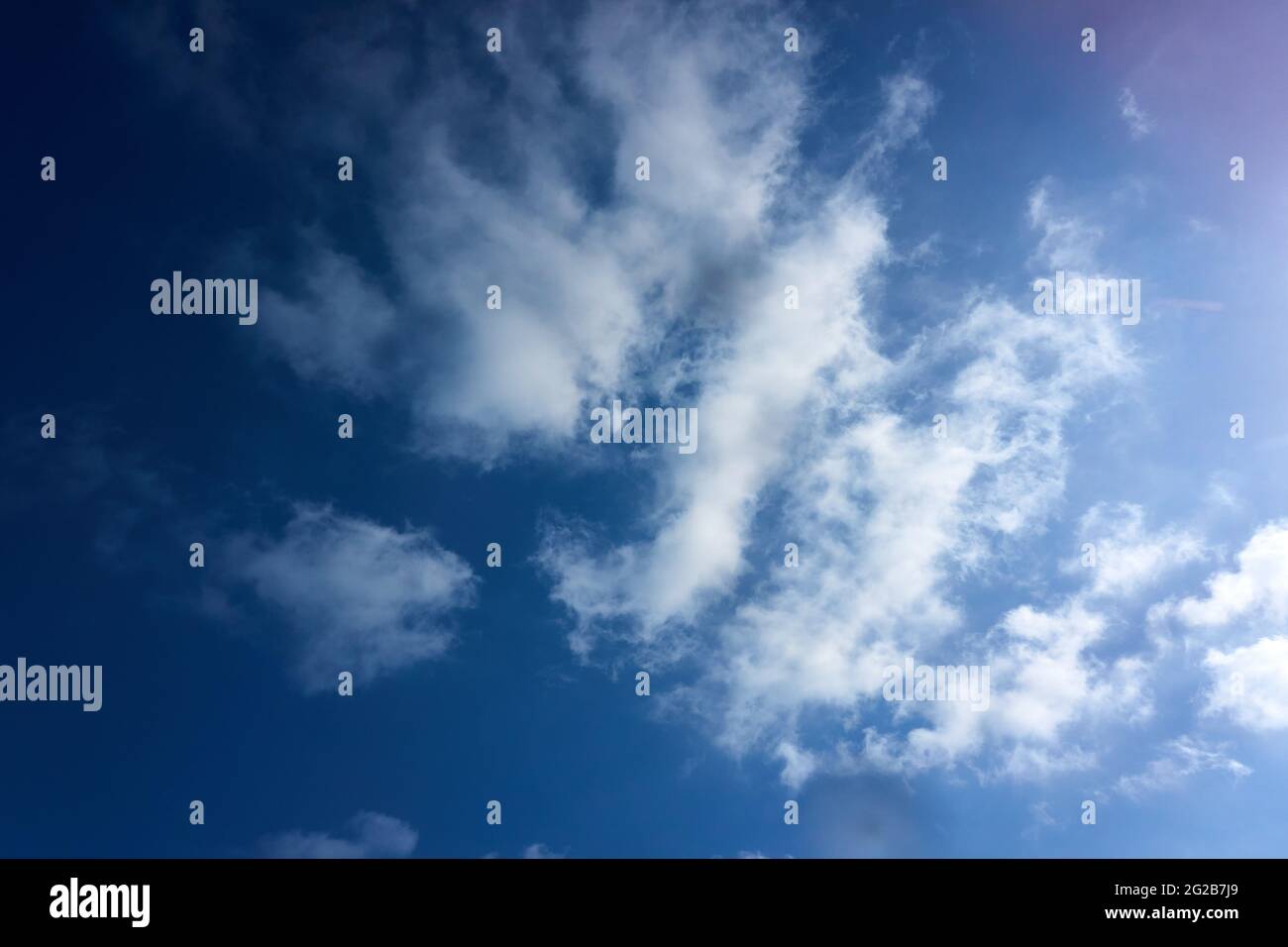 Light clouds in the blue sky. Stock Photo