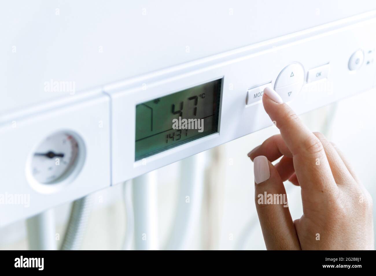 The choice of the eco mode of operation of the heating gas boiler Stock Photo