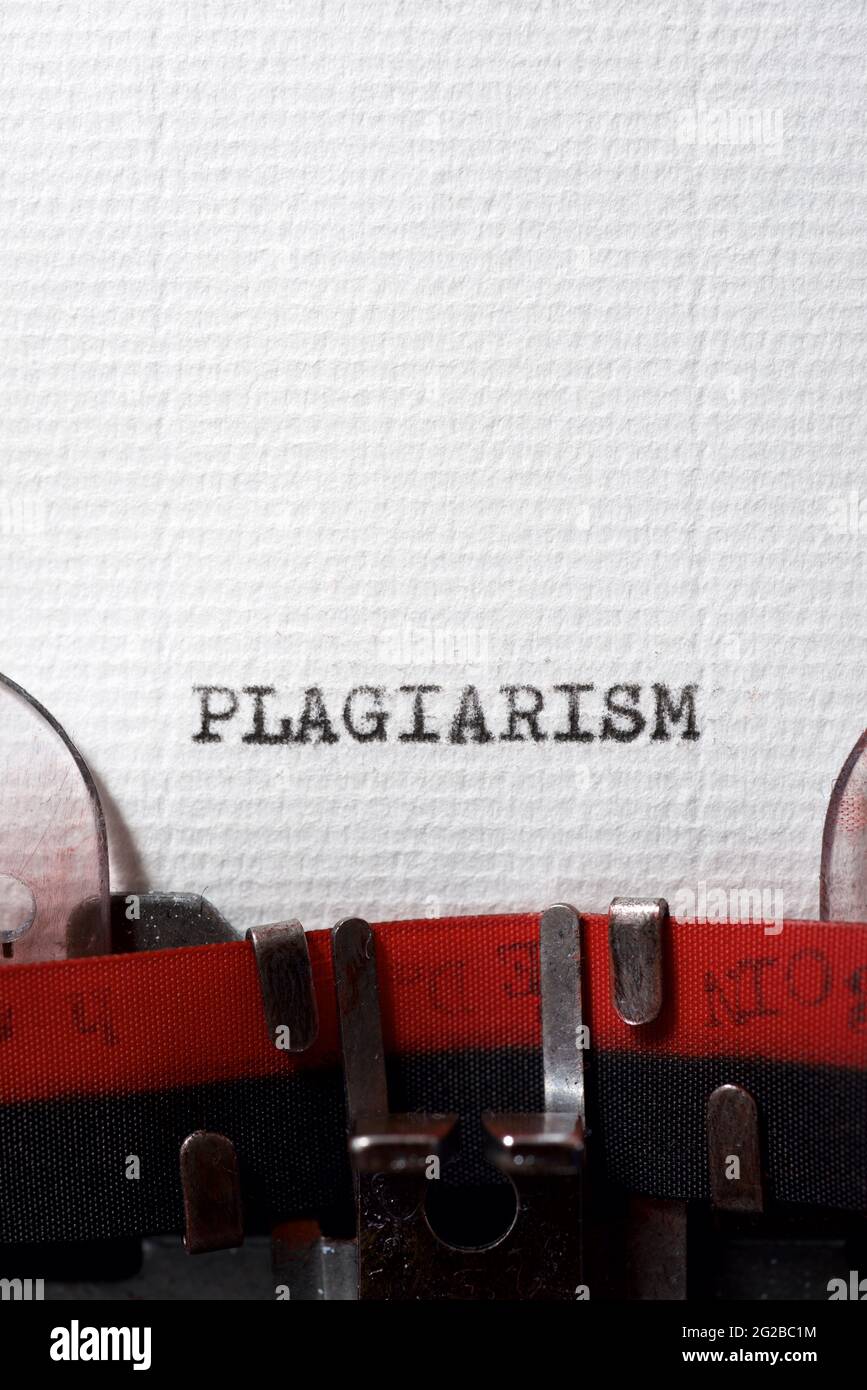 The word plagiarism written with a typewriter. Stock Photo