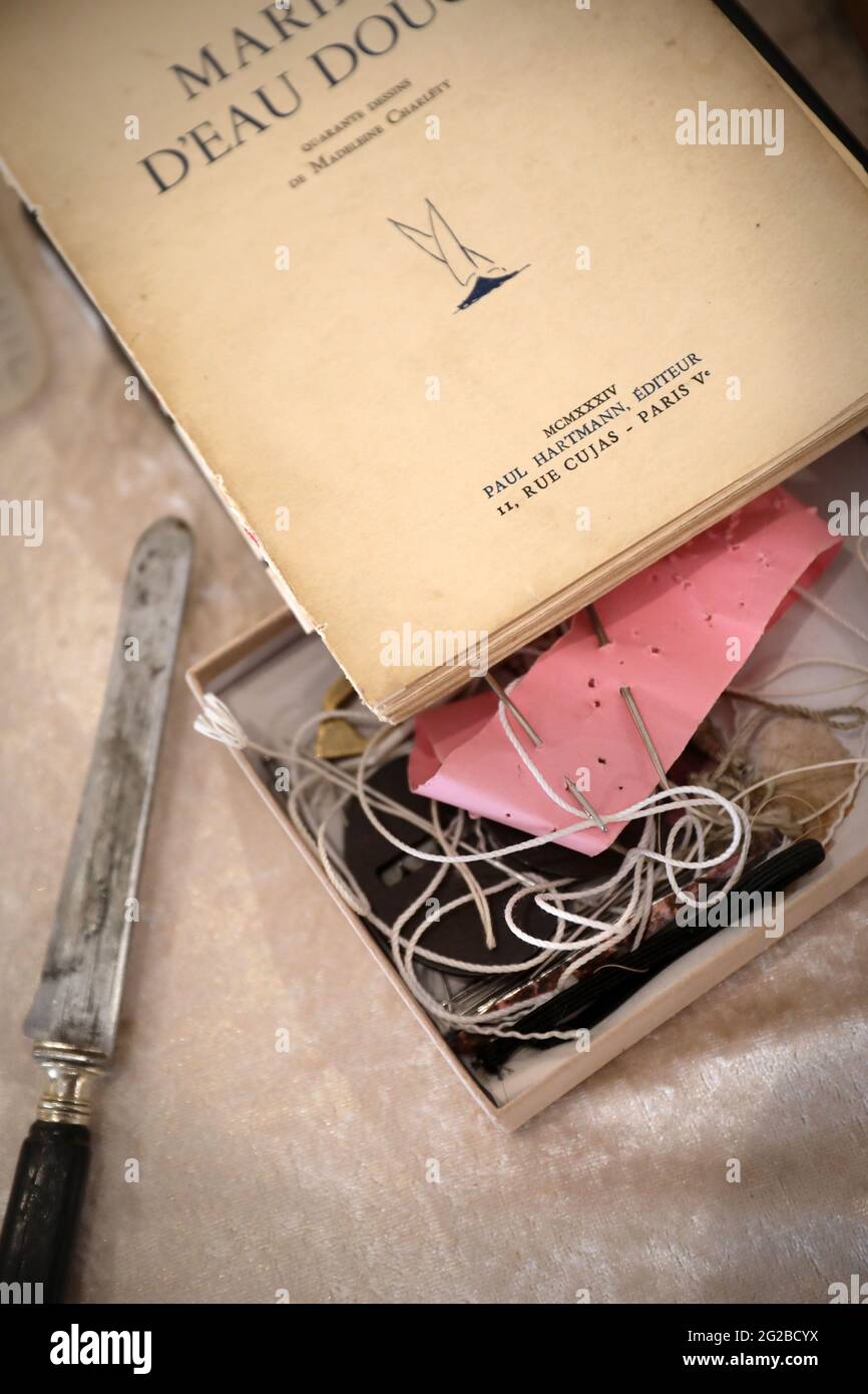 Bookbinding book before binding and bookbinder’s tools Stock