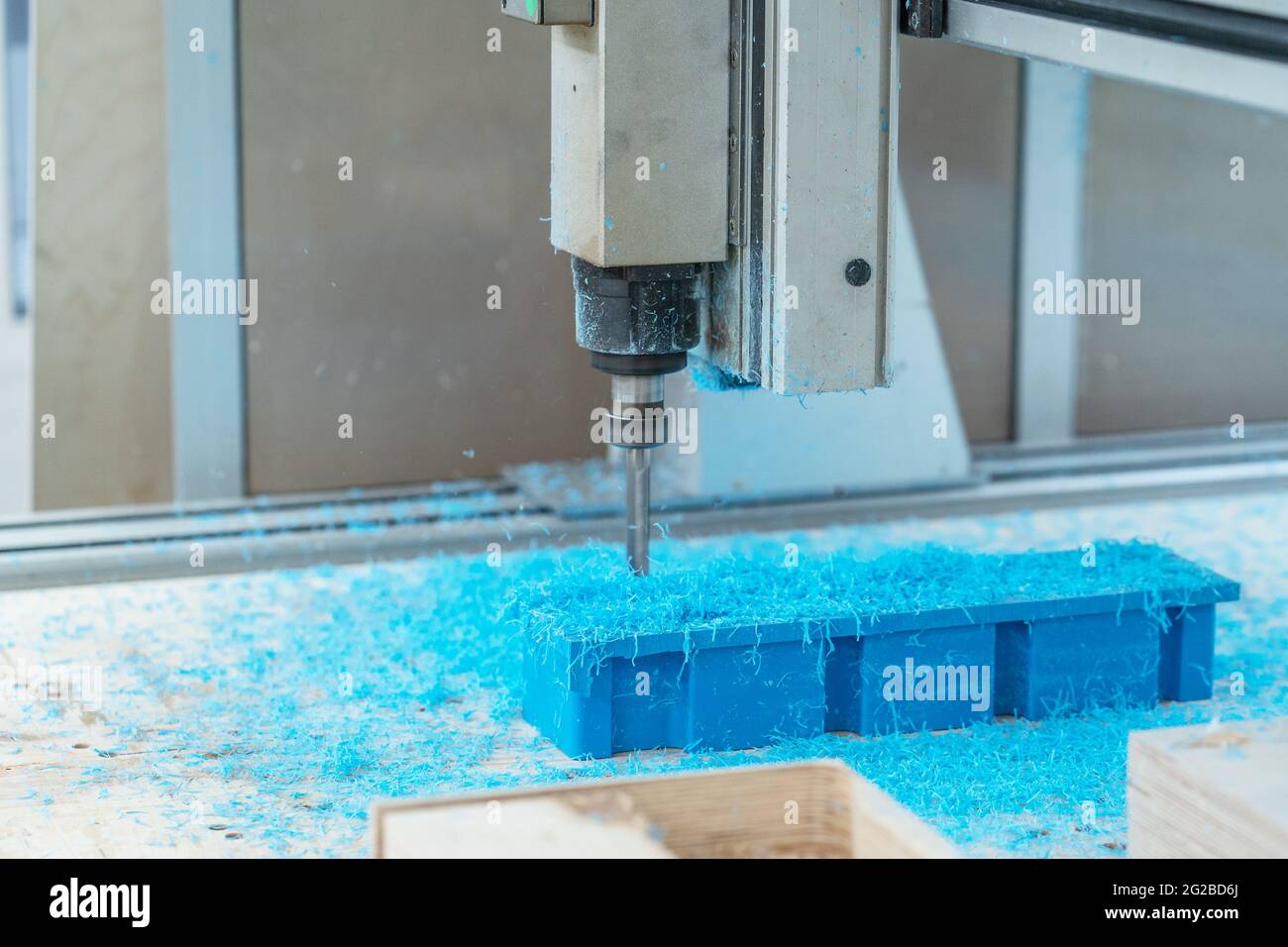 CNC drill machine cutting mold from plastic, close up. Stock Photo