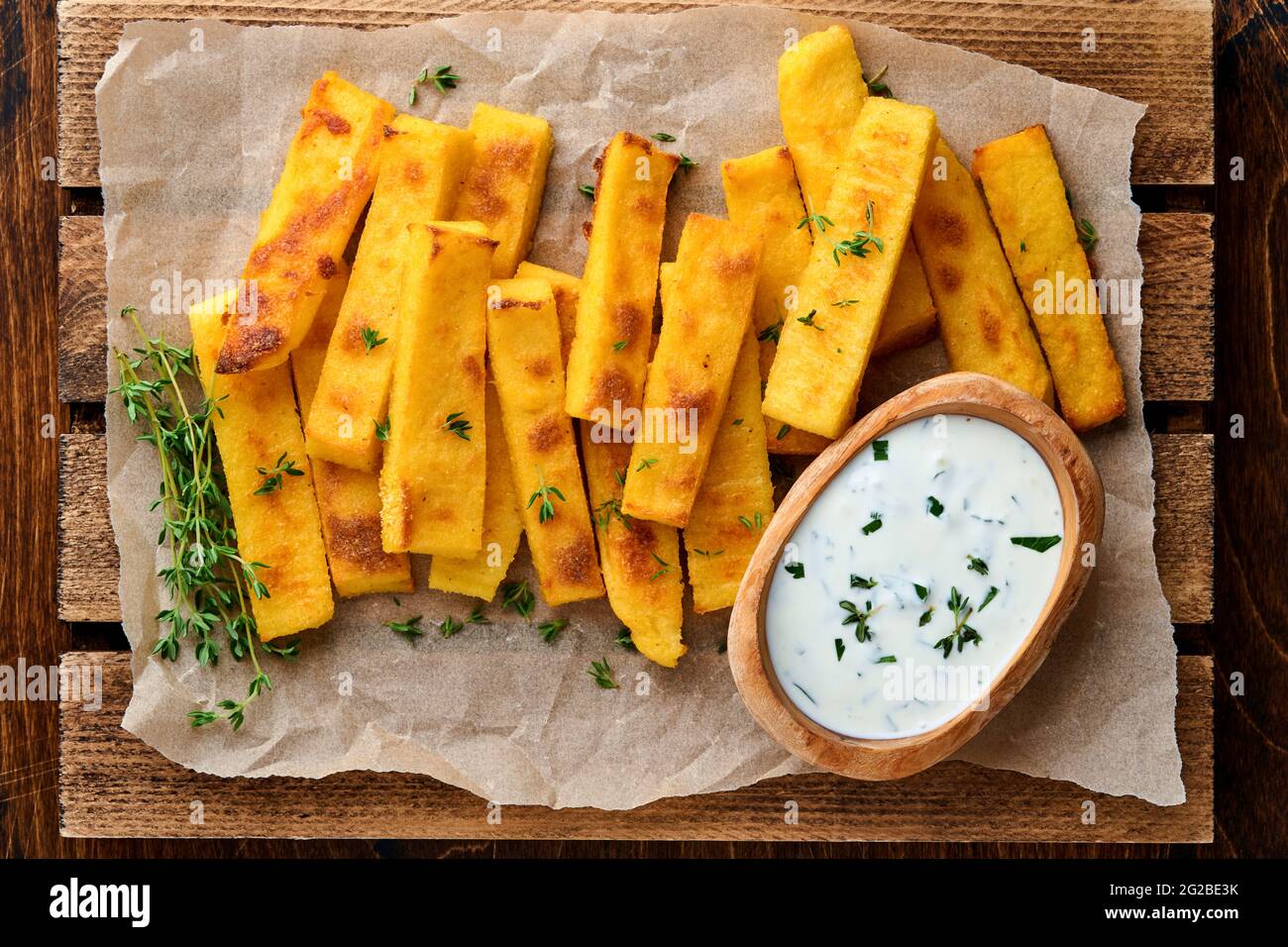 Homemade polenta chips fries with sea salt, parmesan, thyme, rosemary