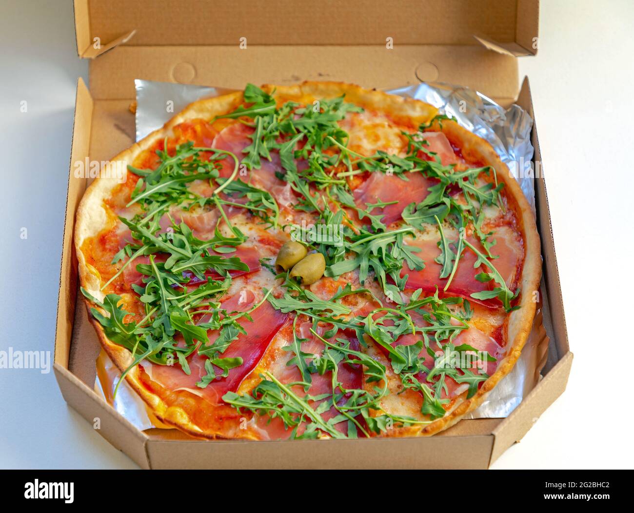 Gluten Free Pizza in Box Home Delivery Stock Photo - Alamy