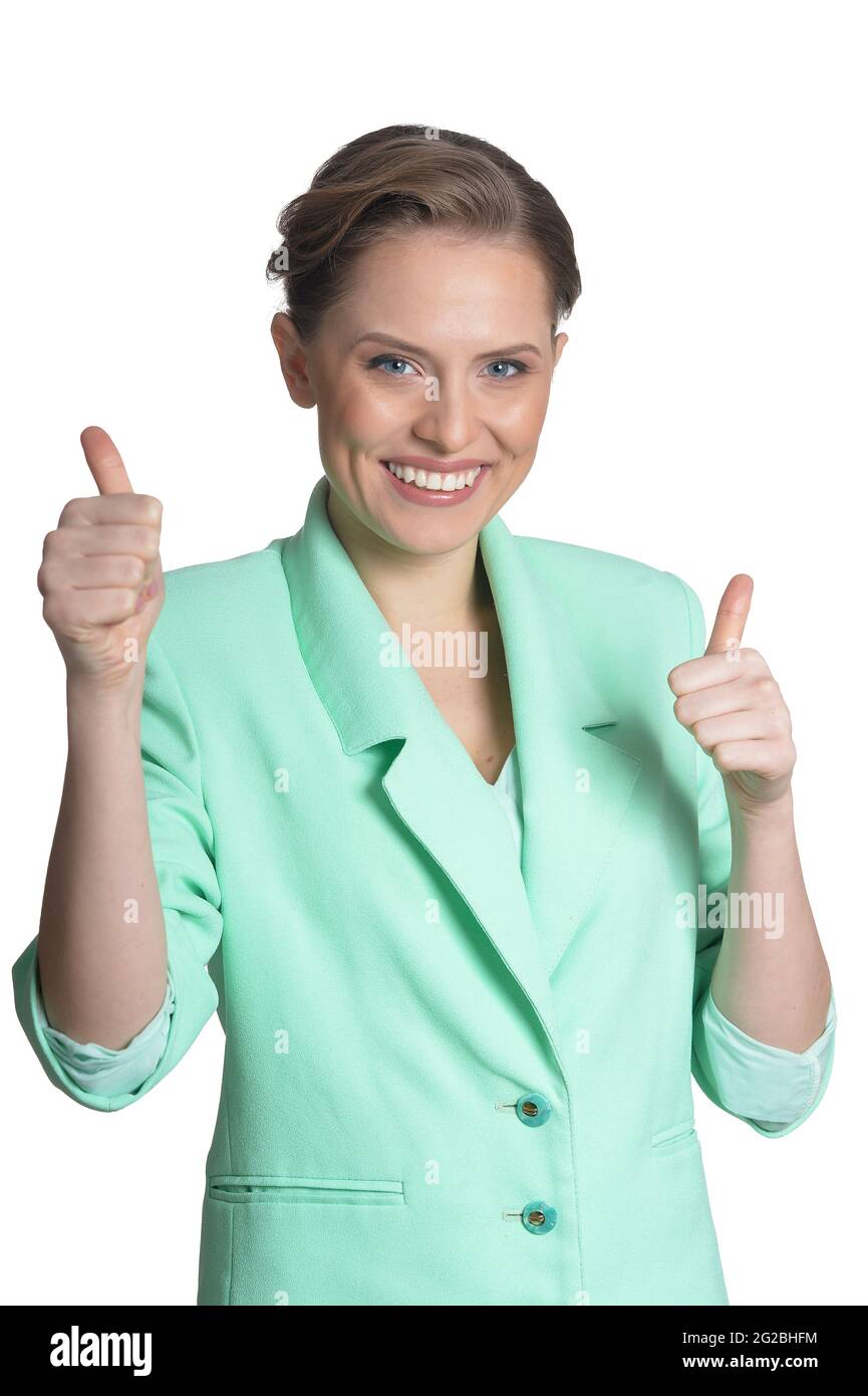 Portrait of beautiful young woman with thumbs up Stock Photo - Alamy