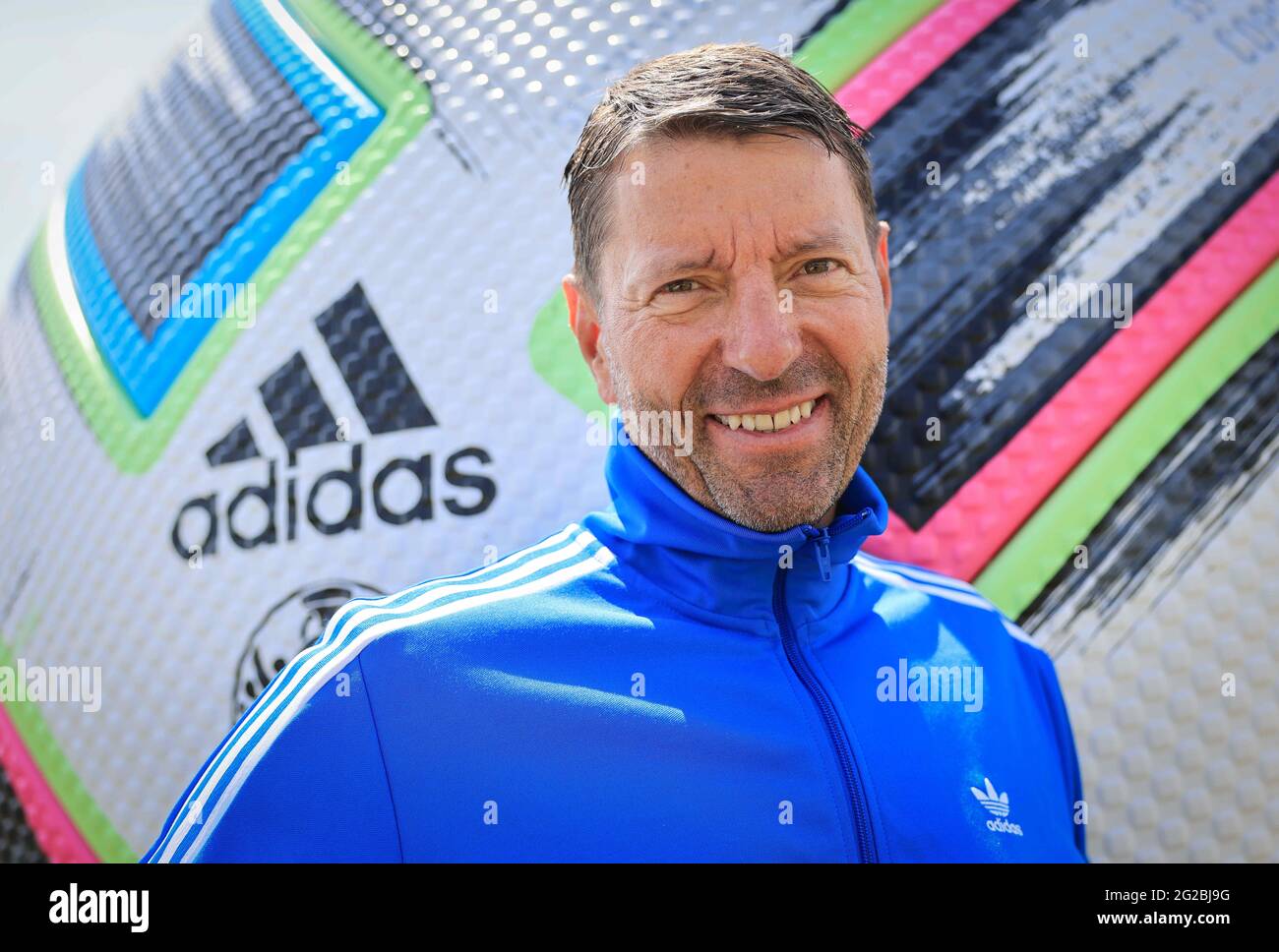 Herzogenaurach, Germany. 10th June, 2021. Kasper Rorsted, CEO of Adidas AG,  stands during a brief photo session with an official EURO 2020 