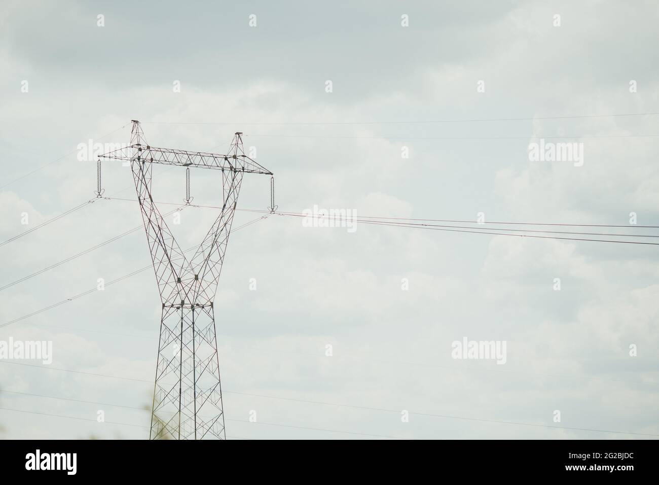 Power transmission line on a cloudy day Stock Photo - Alamy