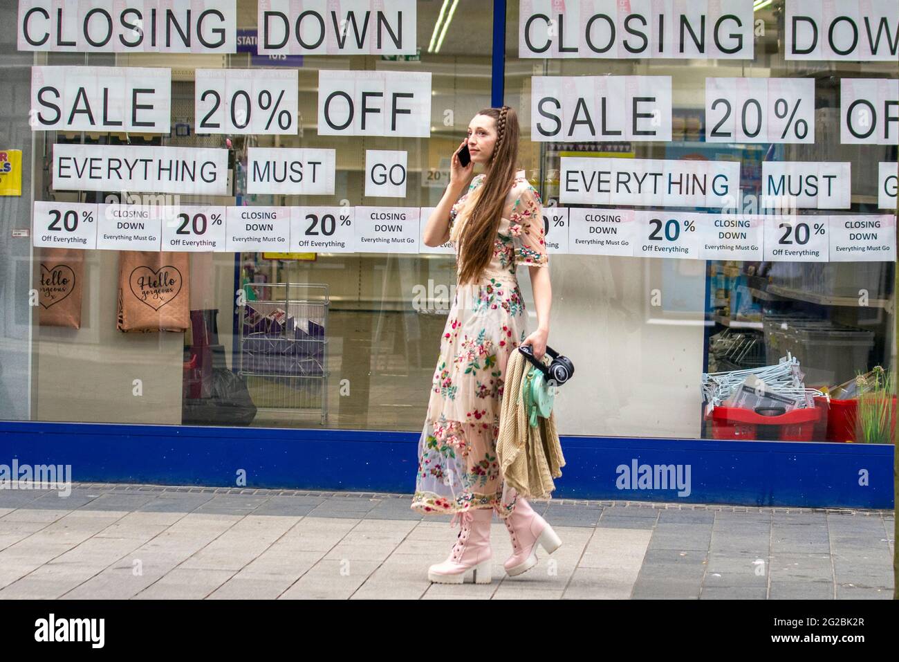 Southport, Merseyside, UK Weather 10 June, 2021. Shops, shoppers, and people shopping. Summer fashions on display on a warm overcast day in the town centre. Credit MediaWorldImages/AlamyLiveNews Stock Photo