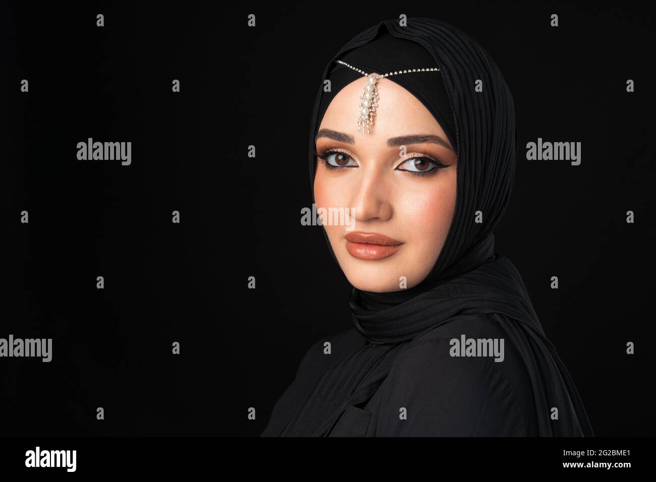 Close up portrait of beautiful muslim girl dressed in hijab Stock Photo ...