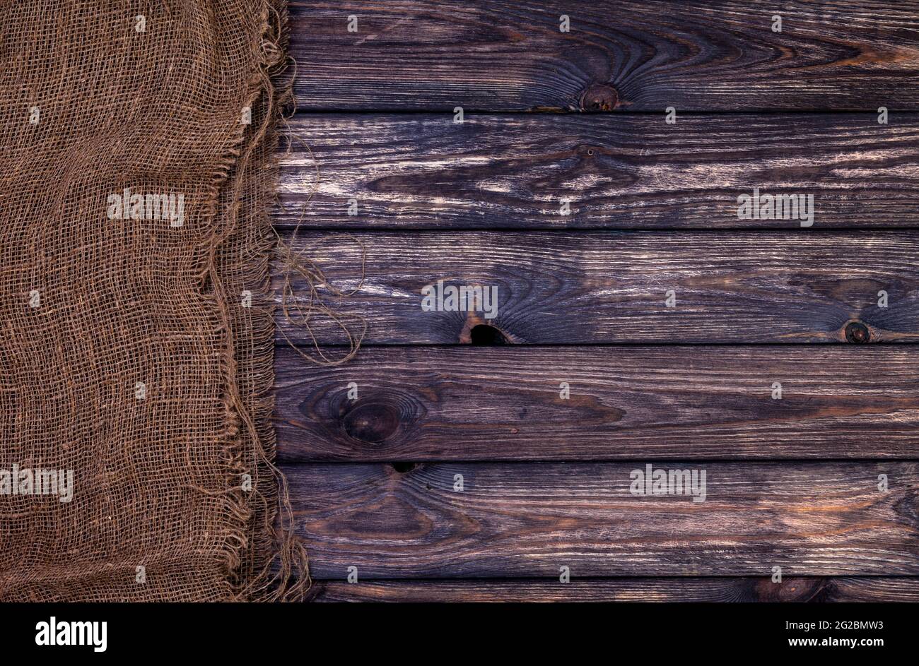 Dark wooden texture with burlap, rustic wood and sack Stock Photo - Alamy
