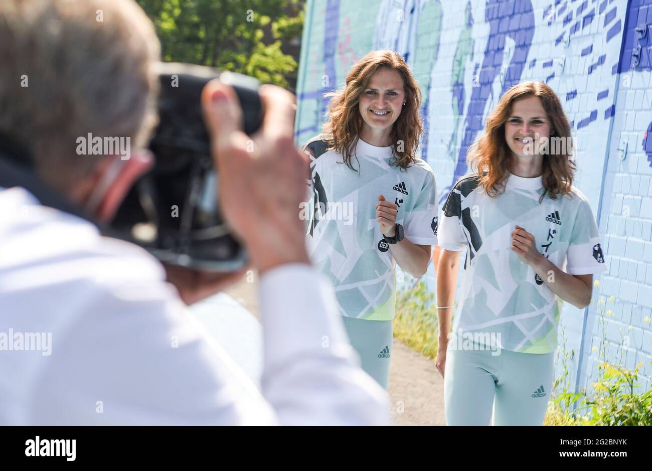 Berlin, Germany. 10th June, 2021. The twins and track and field athletes  Deborah Schöneborn (l) and Rabea Schöneborn (r) are photographed. Athletes  are dressed for the Tokyo 2021 Olympic Games at Team