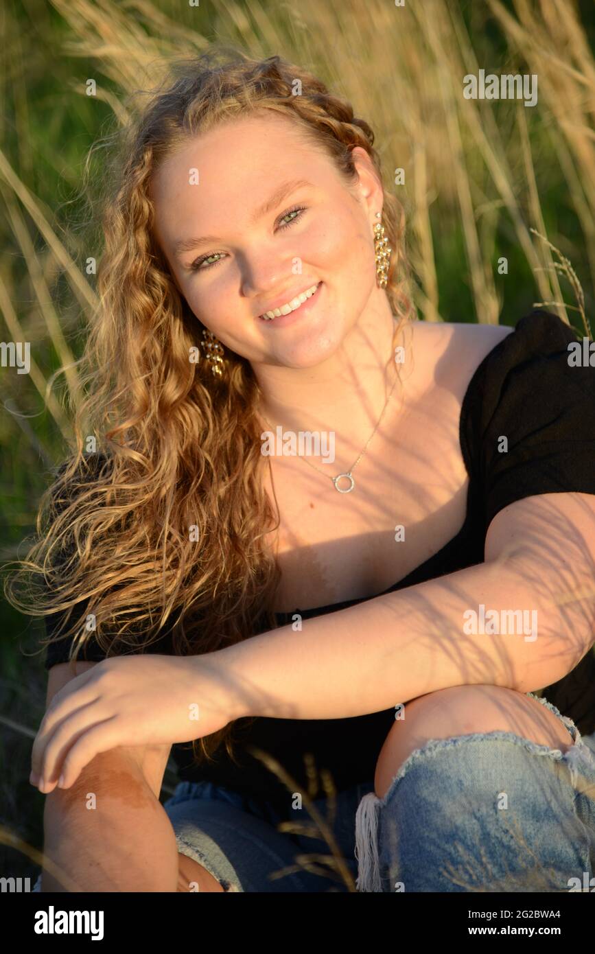 Girl blonde curly hair blue eyes hi-res stock photography and images ...