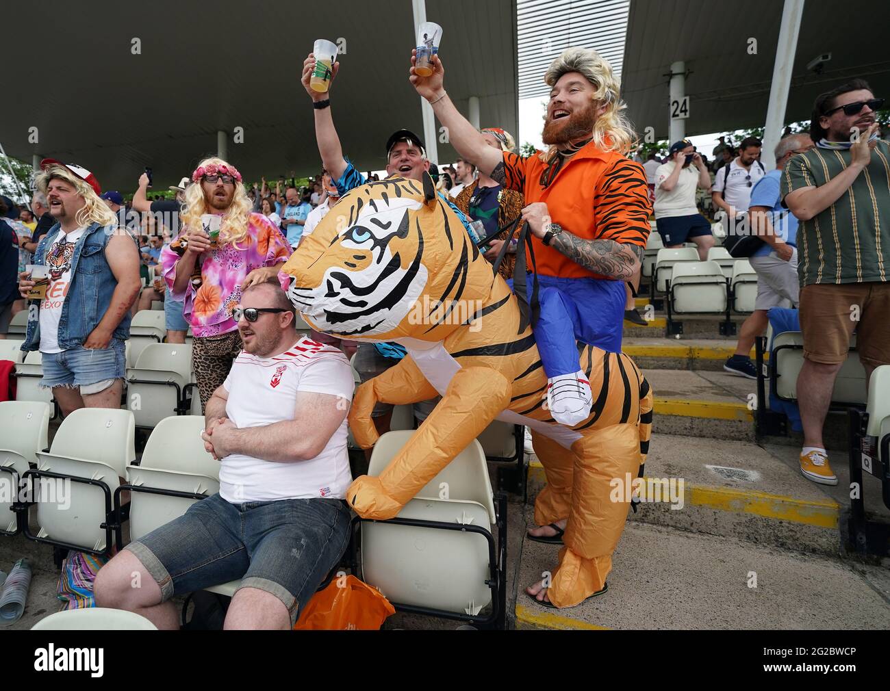 Fans in the stands who are part of the government’s latest pilot event which is allowing up to 18000 (70% of full capacity) in attendance during day one of the second LV= Insurance Test match at Edgbaston, Birmingham. Picture date: Thursday June 10, 2021. Stock Photo