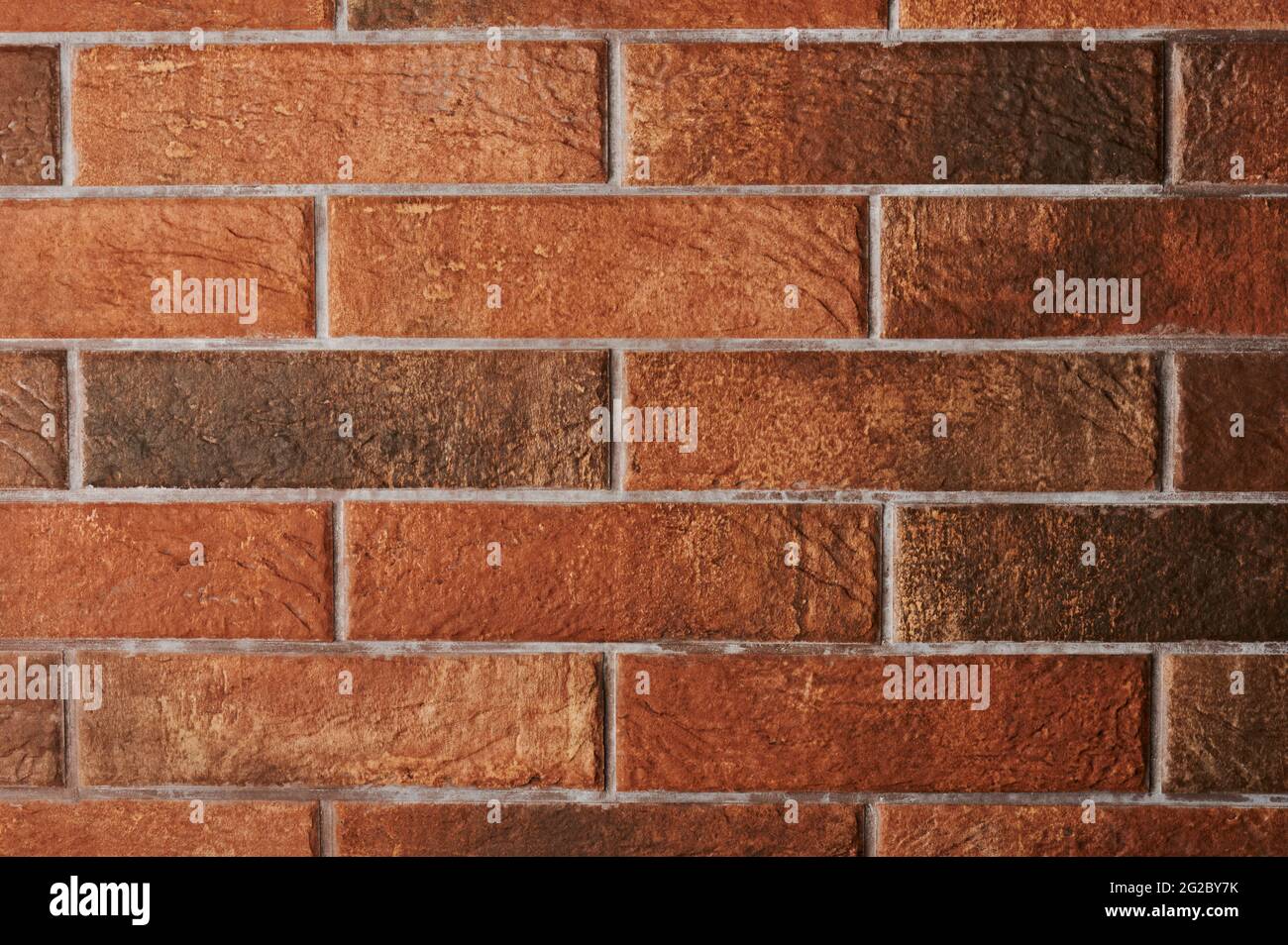 Wall of red brickwork flat view. Pattern of brown bricks Stock Photo