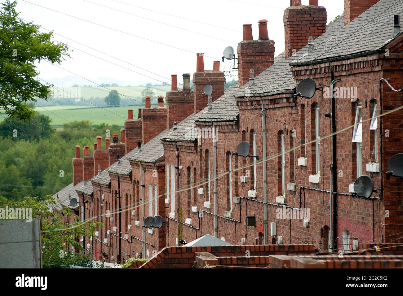 Row of terraced houses in the market town of Bolsover, Derbyshire, England. Stock Photo