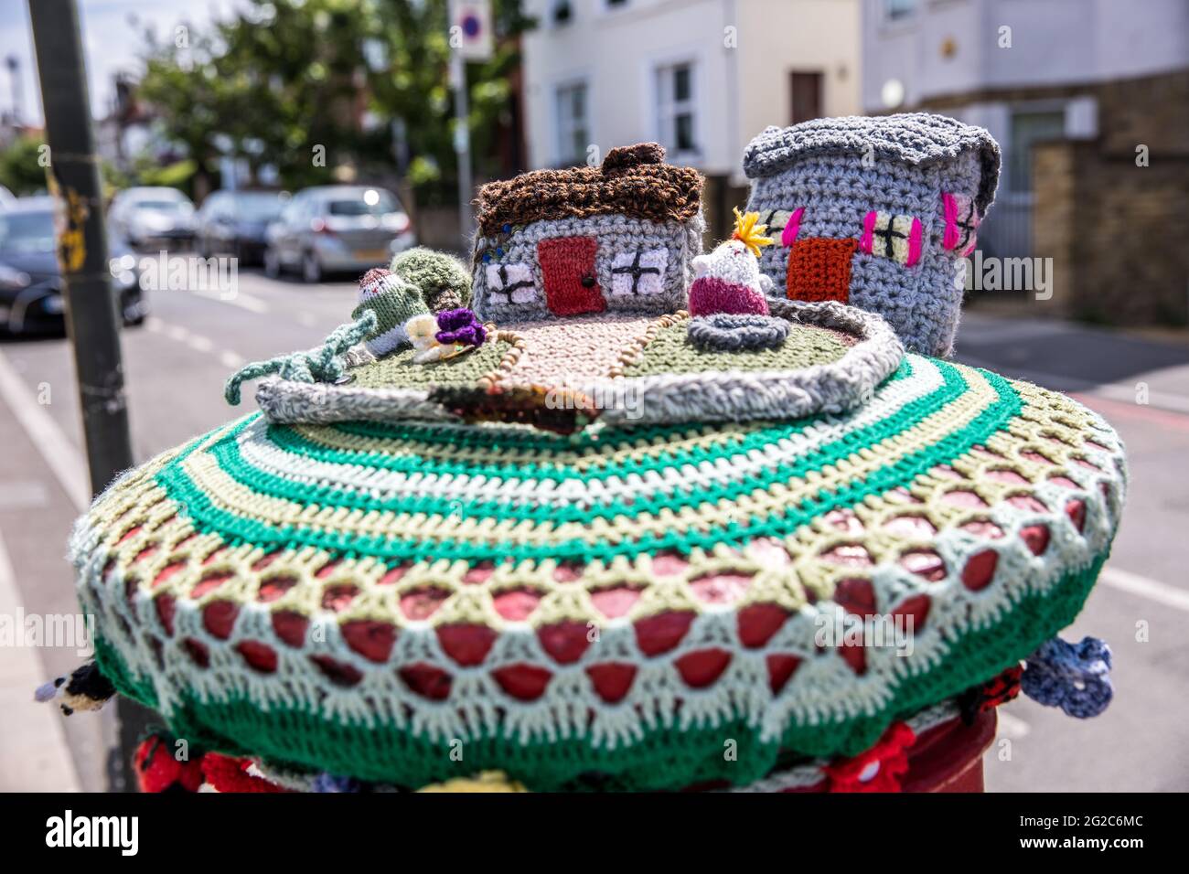 Yarn bombing on post boxes in Colliers Wood South London. Stock Photo