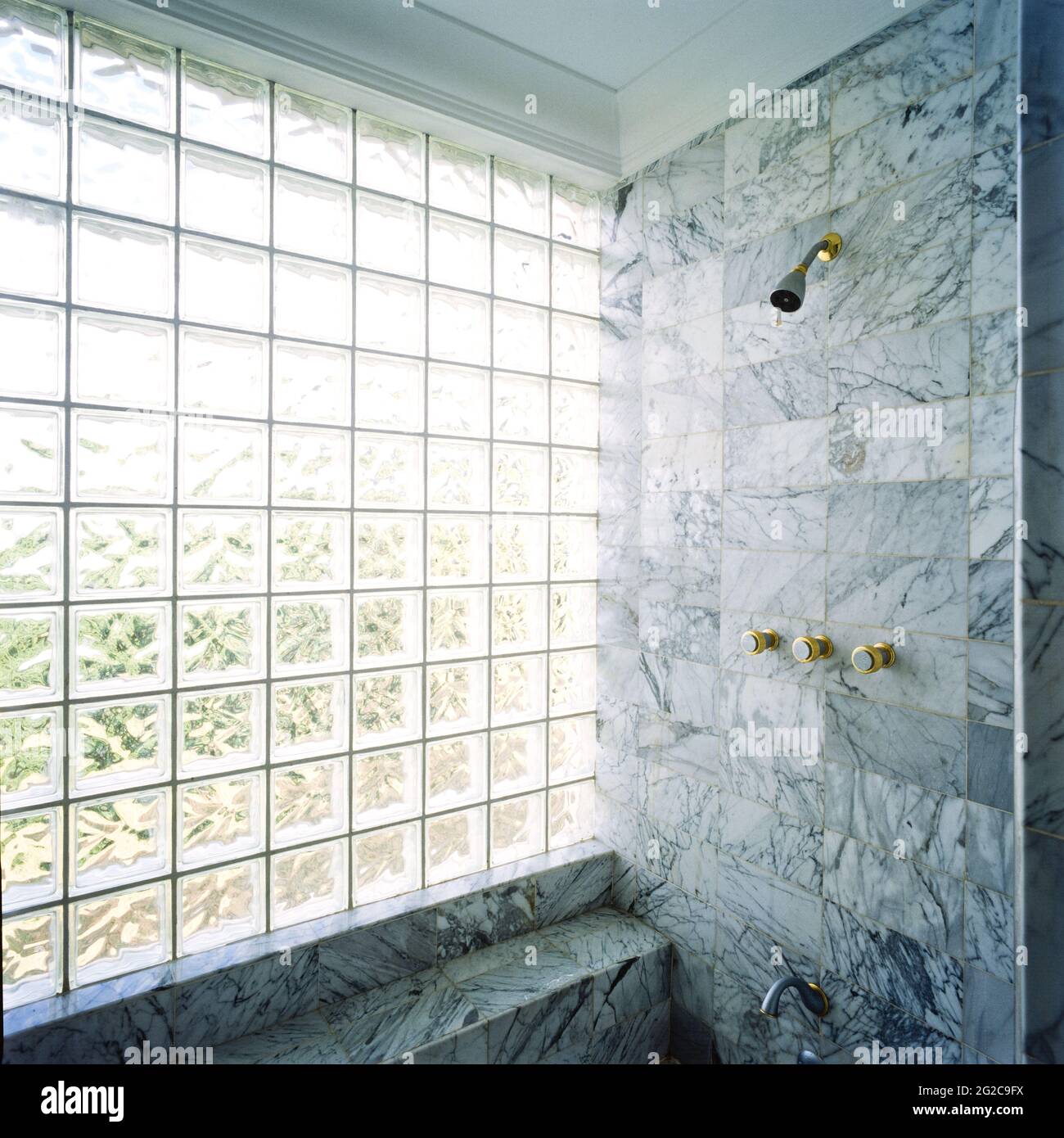 Glass tiled window by shower Stock Photo - Alamy