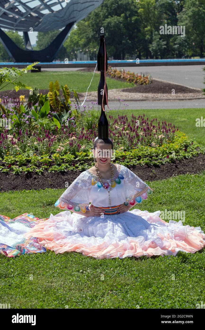 A members of a Paraguayan American folk dancing group poses for photos