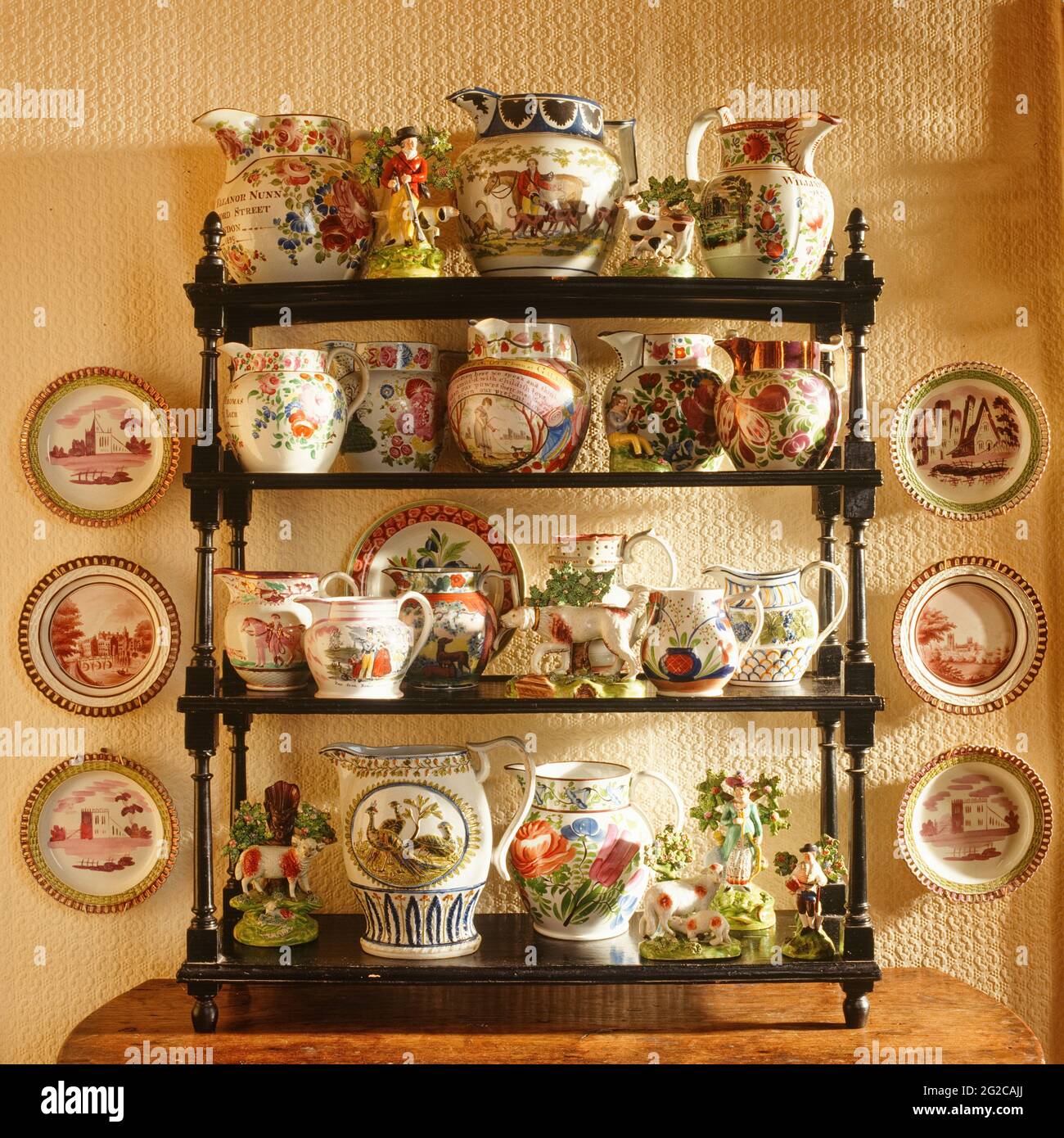 Vintage tableware on shelves Stock Photo